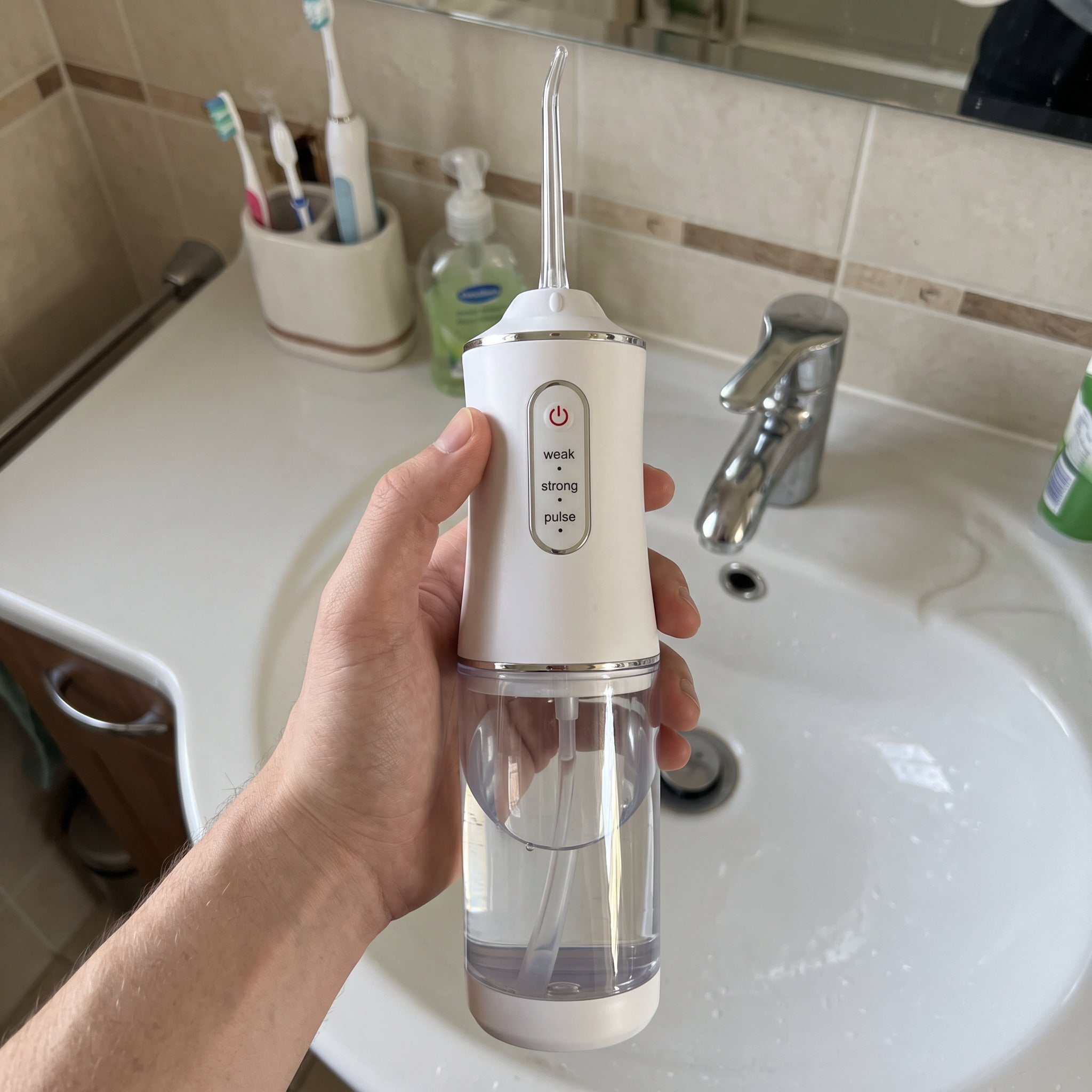 Freshflow beside a bathroom basin